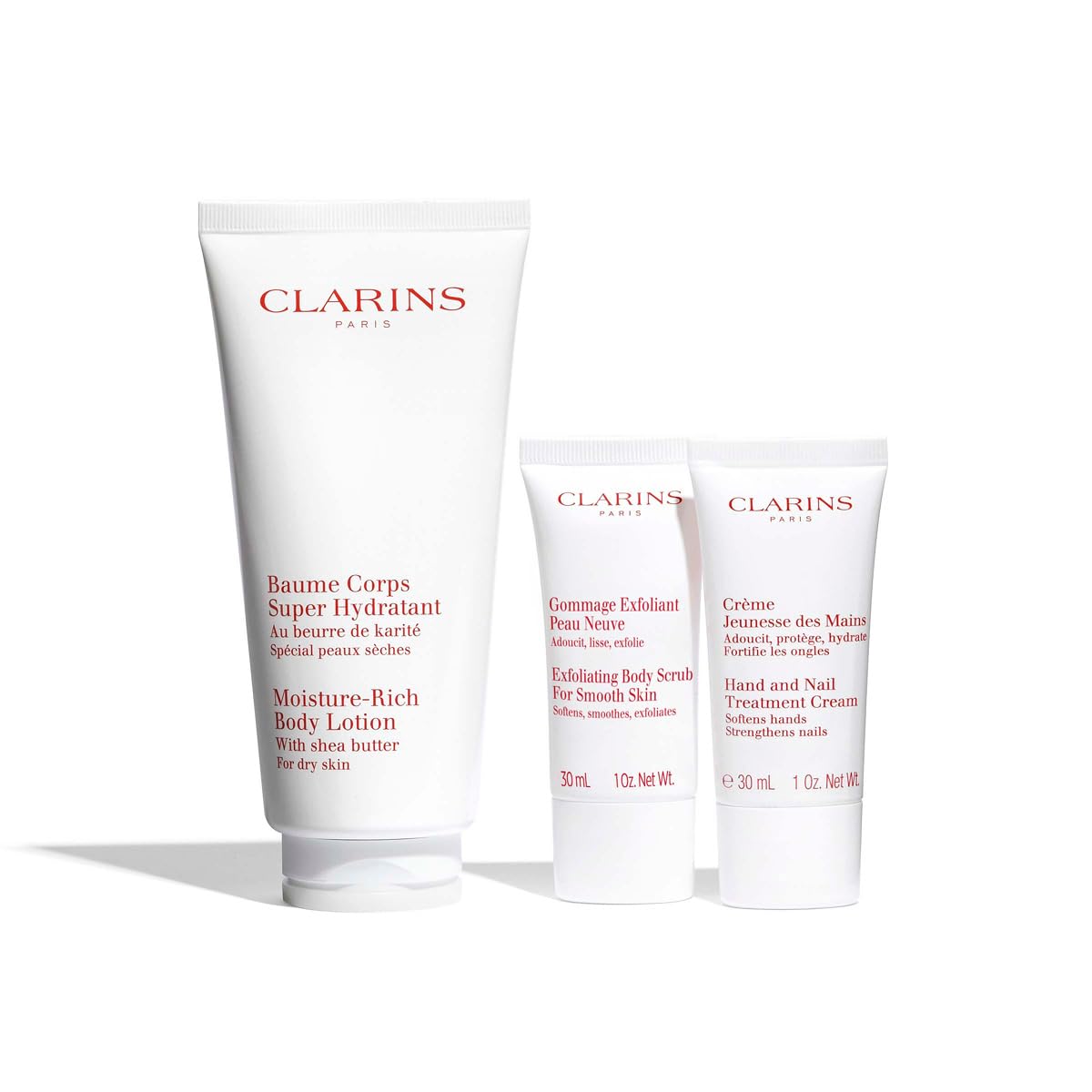 Clarins Body Care Set: Rich Body Lotion 200ml + Hand and Nail Treatment Cream 30ml + Body Scrub 30ml