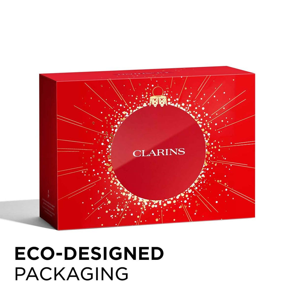 Clarins Body Care Set: Rich Body Lotion 200ml + Hand and Nail Treatment Cream 30ml + Body Scrub 30ml