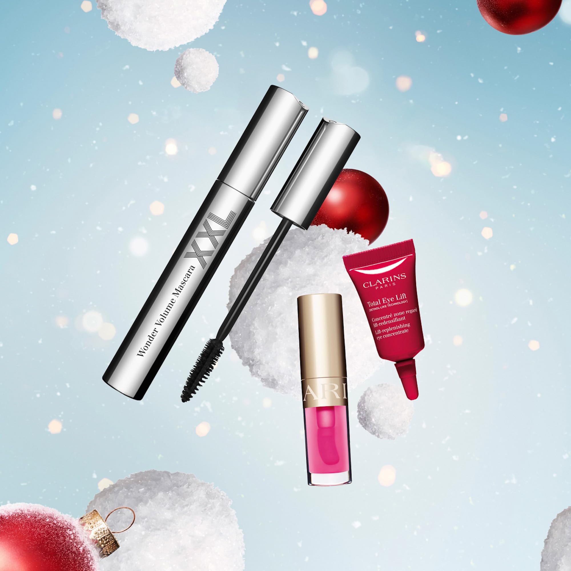 Clarins Wonder Volume Set: Wonder XXL Mascara 8ml + Lip Comfort Oil 1.4ml + Total Eye Lift Cream 3ml